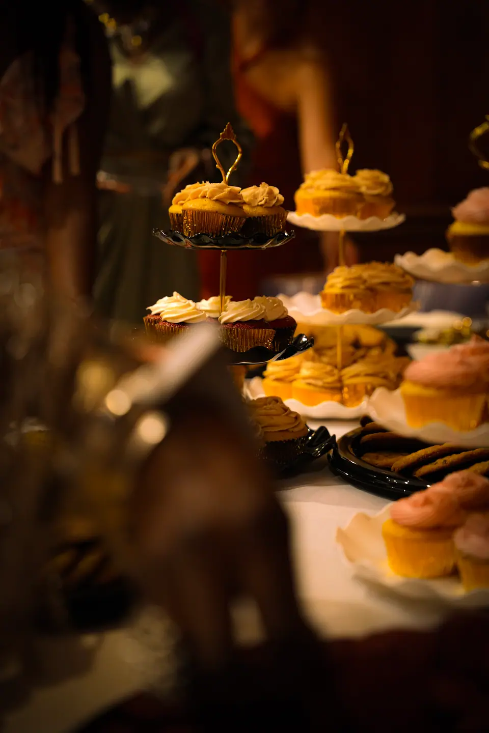 A close view of cupcakes on a tiered wedding display